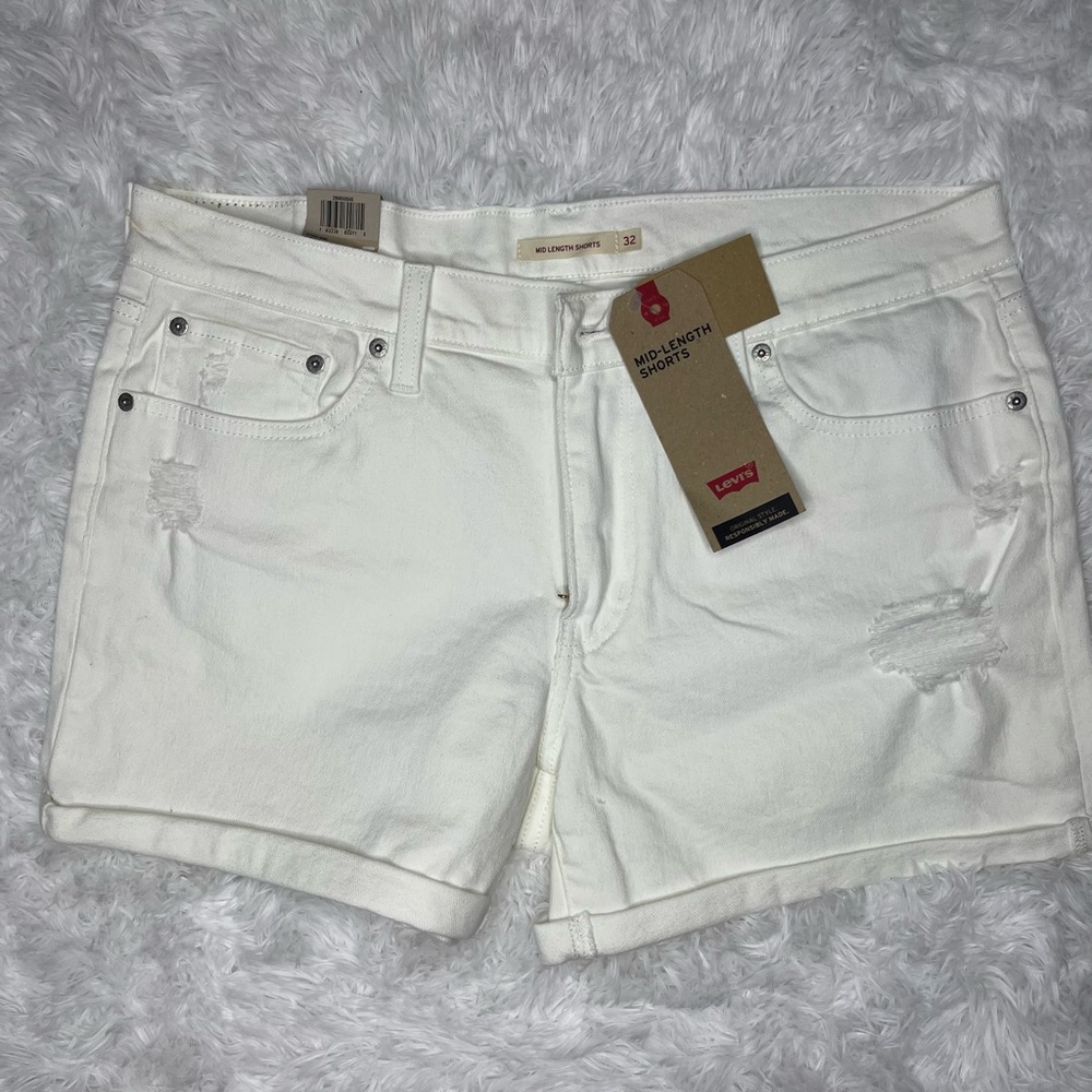Levi’s mid waist size 34 off white